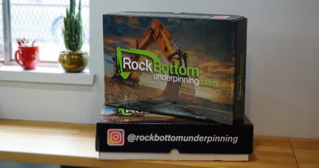 Custom Designed Gift Boxes for Rockbottom Underpinning with Instagram Handle printed on it promotional item