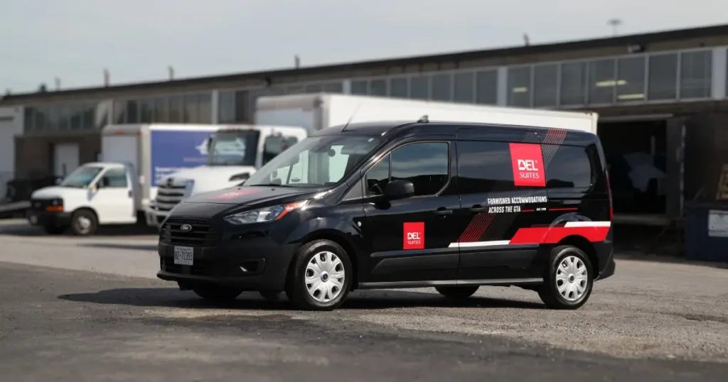 Side view of a Ford Transit showcasing decalings